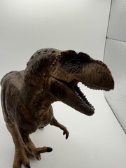 4.1 x 7.9 x 7.1 inch The Giganotosaurus