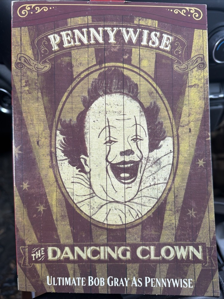 NECA Ultimate Bob Gray as Pennywise The Dancing Clown Welcome To Derry In Hand