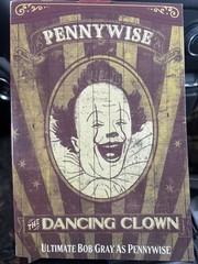 NECA Ultimate Bob Gray as Pennywise The Dancing Clown Welcome To Derry In Hand