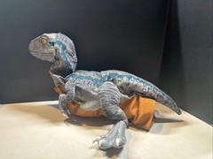JURASSIC WORLD Baby Blue Dinosaur Animatronic Hand Puppet – Real FX Wow Stuff