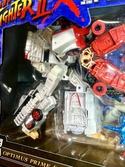 2022 Street Fighter II x Transformers – Optimus Prime (RYU) vs Megatron (BISON)