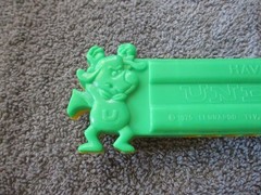 1975 Plastic Green/Yellow Toy Harmonica Have No Fear Underdog Is Here Lednardo