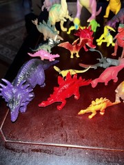 Large Lot of 34 Plastic Resin, Acrylic.-Resin and Rubberl Dinosaur figures.