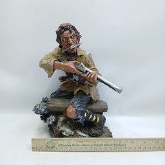 Resin Pirate 10″ Statue with Knife, Musket & Pistol on a bench with treasures