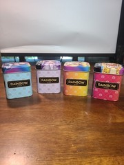 Rainbow High Surprise collectible Tins: VIOLET, SUNNY, SKYLER, SUNNY. USED. READ