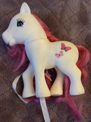 Girls White Pony With Butterflies And Blue Eyes And Pink Hair 4″