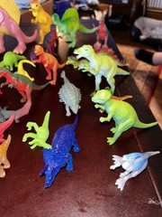 Large Lot of 34 Plastic Resin, Acrylic.-Resin and Rubberl Dinosaur figures.