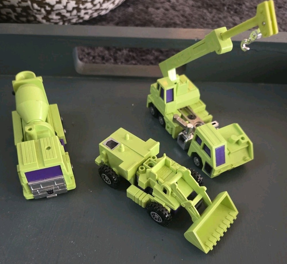 Constructicons (Mixmaster, Scavenger, and Hook) from the original TransformerG1
