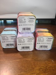 Rainbow High Surprise collectible Tins: VIOLET, SUNNY, SKYLER, SUNNY. USED. READ