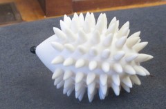 Adorable White Hard Plastic Hedgehog Toy – 3½” long x 2″ tall