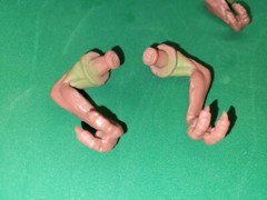 Rod’s Random Works Curled Red Rex Arms(1 pair)