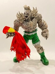 SU-MF-C-SUPBD: Wired battle damaged red cape with logo for McFarlane Superman