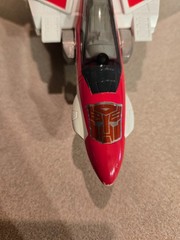 Vintage 1985 Transformers G1 Jetfire figure with accessory pieces.