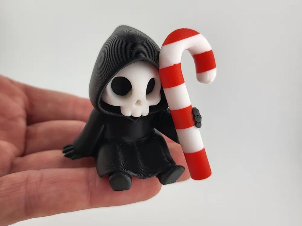 Sitting Grim Reaper with Candy Cane – Cute Goth Christmas Shelf Sitter