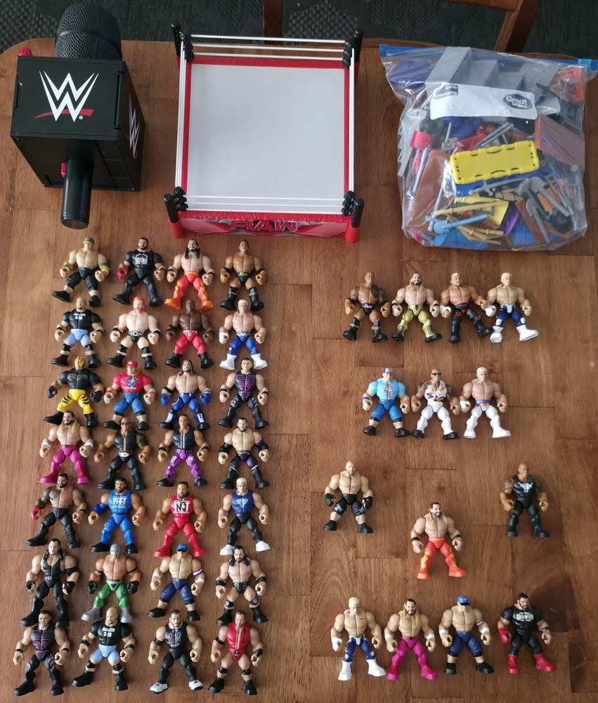 WWE Knuckle Crunchers Action Figures Lot (42) with Ring, Mic, and Accessories