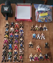 WWE Knuckle Crunchers Action Figures Lot (42) with Ring, Mic, and Accessories