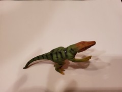velociraptor action figure 5 1/2 inches. Made in china