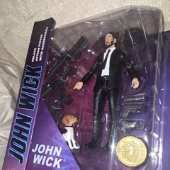 DIAMOND SELECT JOHN WICK DELUXE ACTION FIGURE WITH DOG, COIN & GUNS