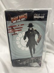 Sealed Mezco ONE:12 COLLECTIVE White Skull Agent: Senor Blanco Figure In hand