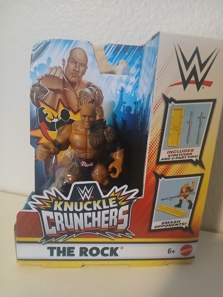 Mattel WWE Knuckle Crunchers – THE ROCK w/ Stretcher & 2-Part Pipe 3″ New