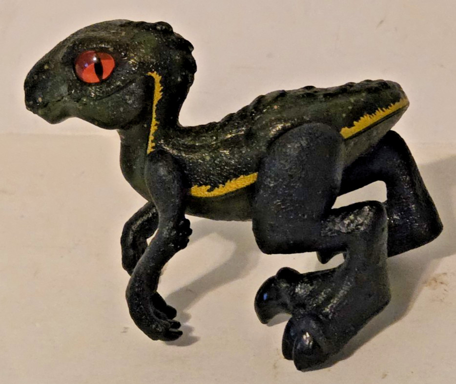 Jurassic World Indoraptor Mini Dinosaur Figure Black Gold Red Eyes Mystery Pack