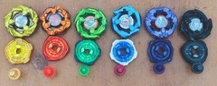 Beyblade Lot Of 6 Metal And Plastic Black Blue Purple Green Orange Gold Spinners
