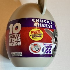 CHUCK E. CHEESE Mystery Surprise Egg Collectible 10 Items Inside w/ E Ticket NEW