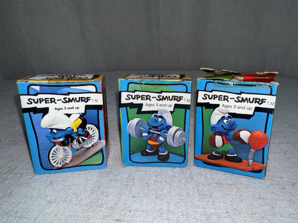 Vintage Super Smurfs LOT PVC Figure SET of 3 in Box Weightlifter Cyclist Boxer