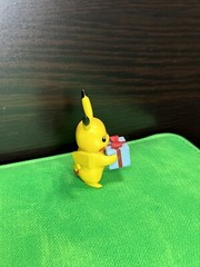 Pikachu Holding A Present Figure 2021 Jawares LLC