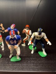 Lot Of 11 1995 & 1996 NFL Kenner Starting Lineup Figures (Lloyd, Seau, Faulk)