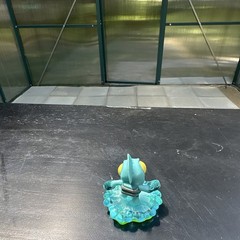 Blue Green Yellow Fish Figure Toy on Wave Translucent Base Plastic