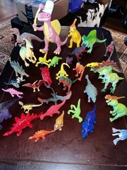 Large Lot of 34 Plastic Resin, Acrylic.-Resin and Rubberl Dinosaur figures.