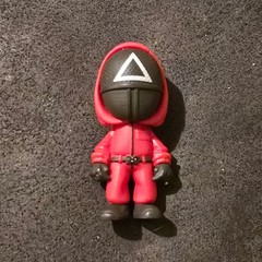 YuMe Piggy Bank Squid Games Mystery Capsule Triangle Solder Mini Figure 2.5″
