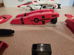Vintage 1985 Transformers G1 Jetfire figure with accessory pieces.