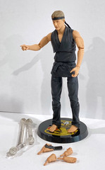 Diamond Select Netflx Cobra Kai Johnny Lawrence 7″ Deluxe Action Figure & Stand