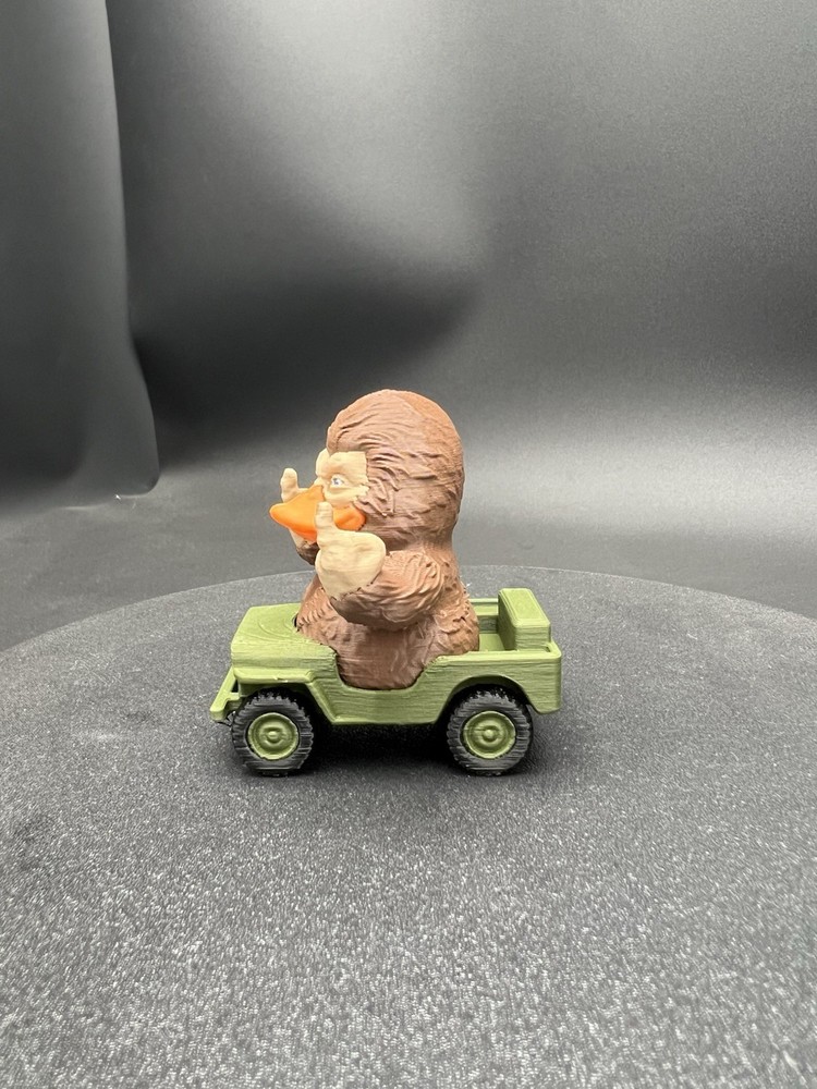Bigfoot Duck In an Off-road Vehicle Giving The Double Middle Finger!