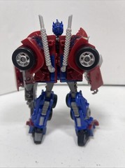 Transformers Prime First Edition Optimus Prime vs Megatron DVD set (Loose Figs)