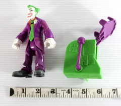 Fisher-Price DC Super Friends Hero World Joker 5″ Figure Toy with Pie Thrower