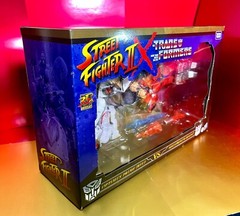 2022 Street Fighter II x Transformers – Optimus Prime (RYU) vs Megatron (BISON)
