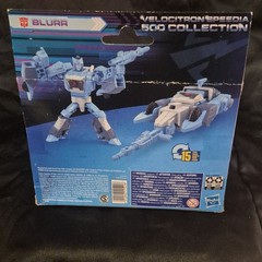 Transformers Legacy Velocitron Speedia 500 Blurr Deluxe Class IDW New In Box.