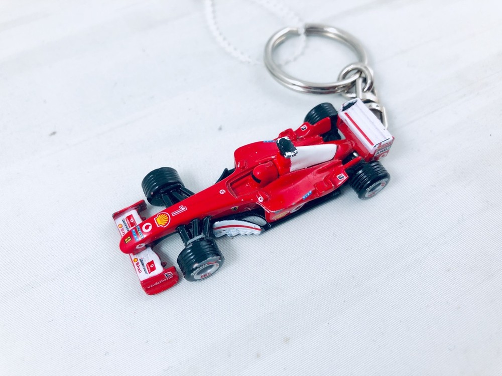 Ferrari F1 2004 World Champion metal keychain Schumacher w/sponsor decal.