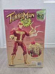 Tiger Electronics Talking Turbo Man 13in Action Figure Lights Sounds Rocket