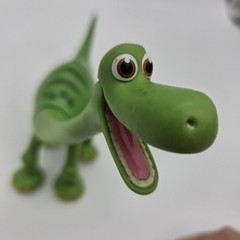 Disney Pixar The Good Dinosaur Arlo Green Toy 7.5” Figure Articulated By TOMY