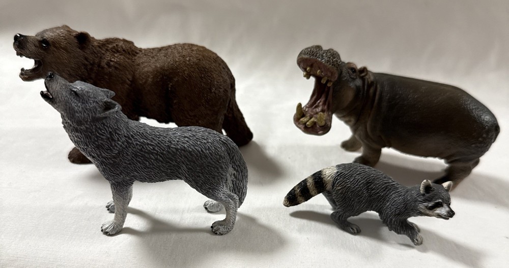 Schleich Animal Figures Lot Of 4 Bear Wolf Hippo Raccoon