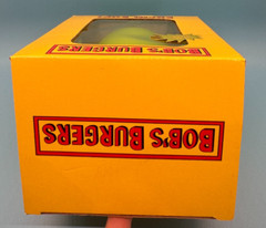 Bob’s Burgers Kuchi Kopi Glow In The Dark Licensed Figure Yellow Box – New