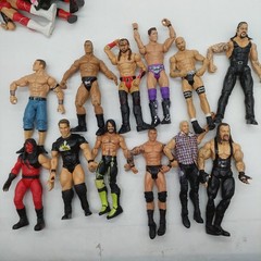 WWE Action Figures lot of 12 Figures Various Years Brands Sizes Read