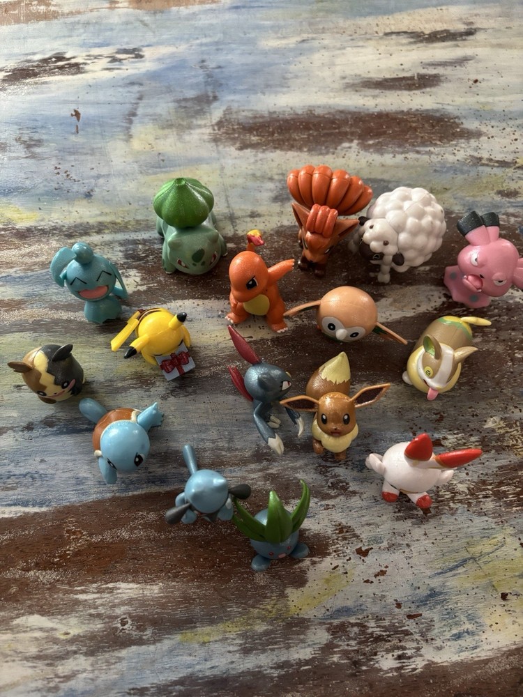 Pokémon Figure Lot 16pc Pikachu Charmander Bulbasaur Eevee Vulpix Squirtle