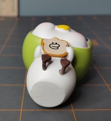 Upset Duck Toast PVC Blind Box Frog Hat 2 1/2″ Tall