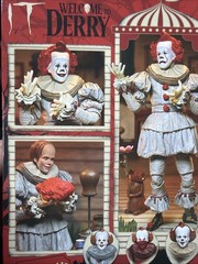 NECA Ultimate Bob Gray as Pennywise The Dancing Clown Welcome To Derry In Hand