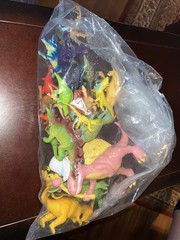Large Lot of 34 Plastic Resin, Acrylic.-Resin and Rubberl Dinosaur figures.